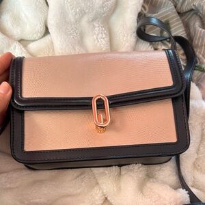 Elegant Black and Cream Crossbody Bag